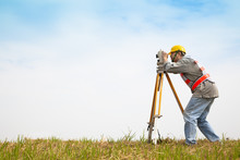 Surveyor Engineer Making Measure On The Field
