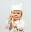 baby in white fur hat