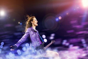 Wall Mural - Rock passionate girl with black wings