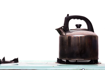 old kettle on a stove isolated on a white background