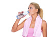 Attractive young fitness woman drinking water