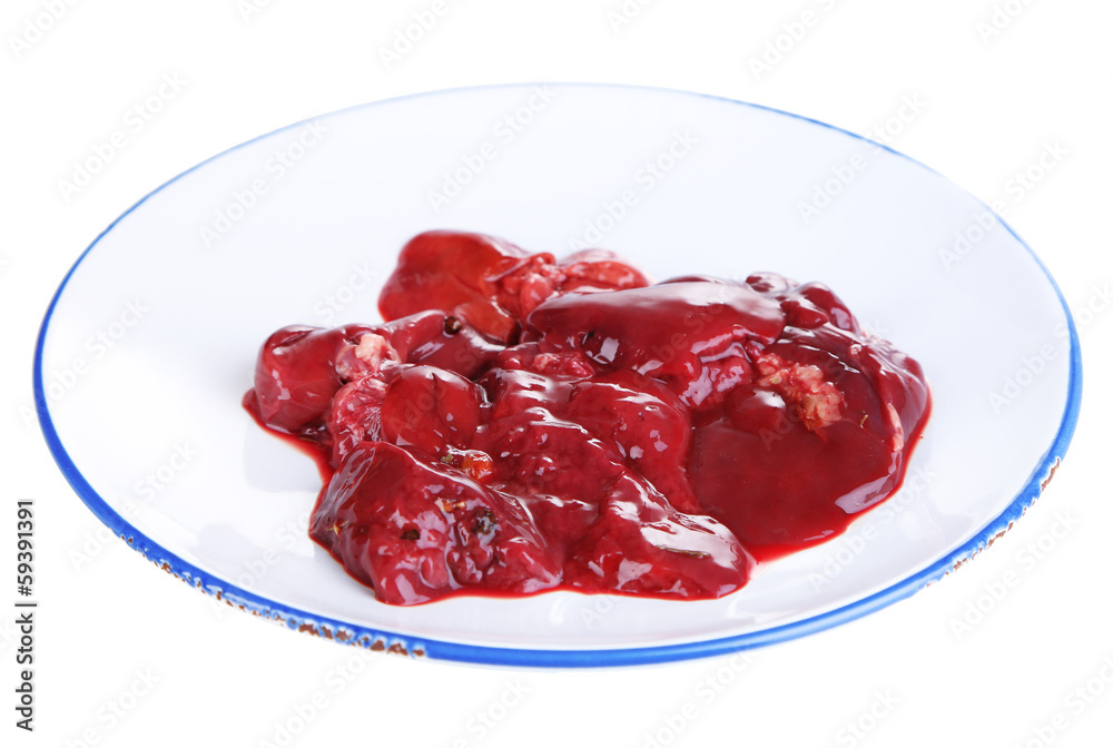 Raw liver on plate isolated on white