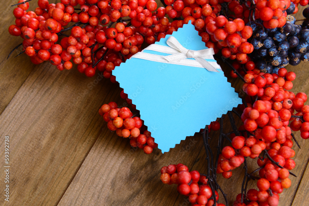 Artificial berries, on wooden background
