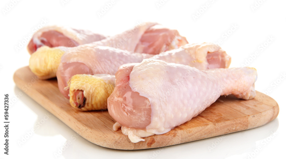Raw chicken legs isolated on white