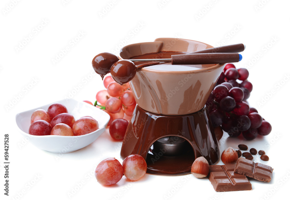 Chocolate fondue with fruits, isolated on white
