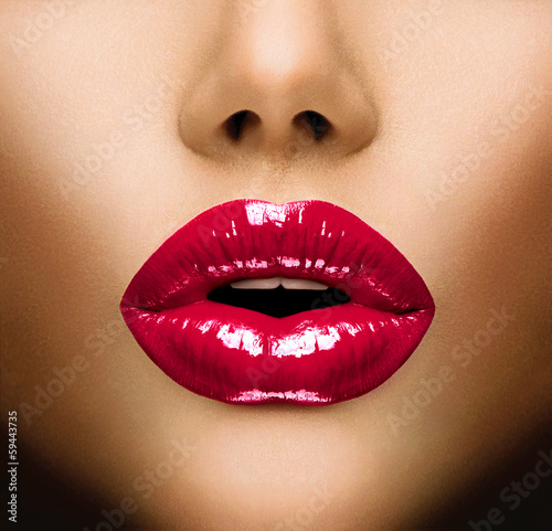 Fototapeta na wymiar Sexy Lips. Beautiful Make-up Closeup. Kiss