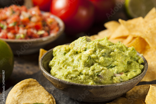 Fotografie, Obraz Green Homemade Guacamole with Tortilla Chips