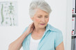 © lightwavemedia - Senior woman suffering from neck pain