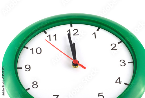Fotografie, Obraz Big wall clock shows almost twelve o'clock isolated
