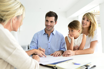 Family meeting real-estate agent for house investment