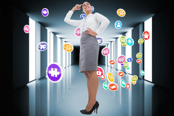 Poster - Composite image of smiling thoughtful businesswoman