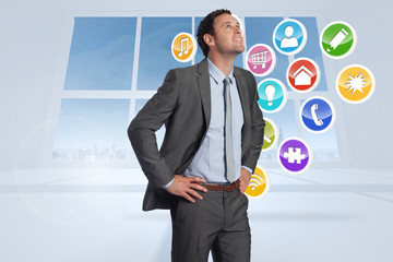Poster - Composite image of smiling businessman with hands on hips