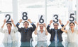 © WavebreakMediaMicro - Group of panel judges holding score signs