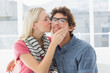 © WavebreakMediaMicro - Woman kissing man on his cheek