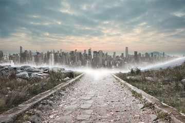 Poster - Stony path leading to large city on the horizon
