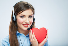 Woman Call Center Operator Hold Love Symbol Red Heart. Close Up