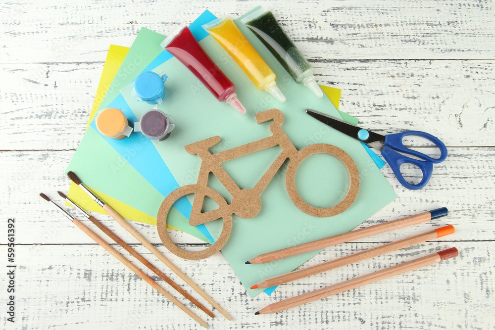 Decorative bicycle with needlework composition