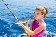 Kid Girl Fishing Tuna Bonito Sarda Kissing Fish For Release