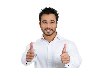 Successful businessman giving thumbs up