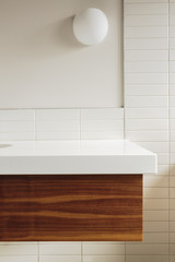 Detail of bathroom counter and tile in modern home