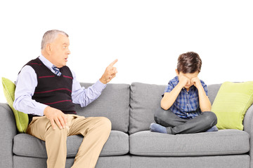 Poster - Angry grandad shouting at his nephew, seated on a sofa