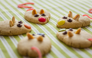 Wall Mural - Cookies with mouse shaped and red licorice tail