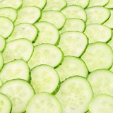 Fototapeta  - Surface coated with a cucumber slices