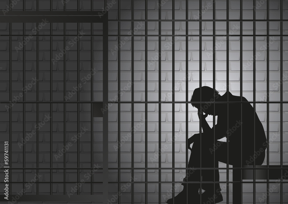 Concept de la prison et de l’arrestation d’un délinquant ou d’un criminel, avec un prisonnier qui assis dans sa cellule qui se tient la tête dans les mains. - obrazy, fototapety, plakaty 