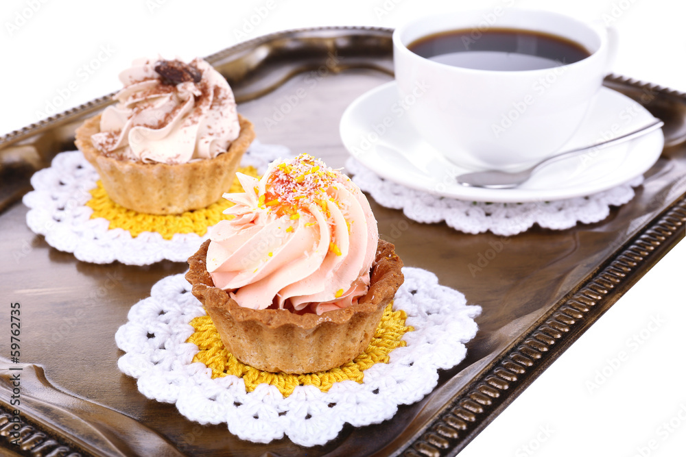 Tasty cakes on tray close-up