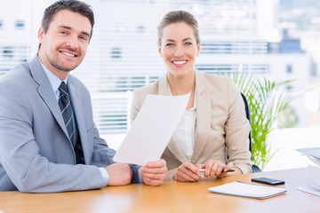 Smartly dressed colleagues in business meeting