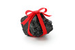 coal with red ribbon