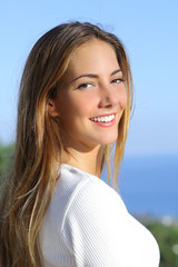 Portrait of a beautiful woman with a white perfect smile