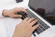 © MDBPIXS - Businessman's hands using laptop