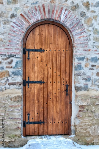 Obraz w ramie Wooden door with arch