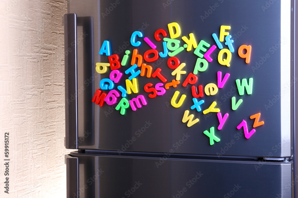 Colorful magnetic letters on  refrigerator