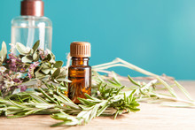 Bottle With Aromatic Oil And Rosemary