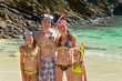 © Iuliia Sokolovska - Happy family snorkeling and having fun on beach vacation