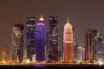 Fototapete - Doha downtown skyline at night, Qatar, Middle East