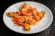 © kerdkanno - Italian cuisine spaghetti and seafood.