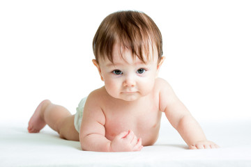 Wall Mural - baby boy lying on tummy isolated on white background