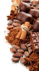 Wall Mural - Composition of chocolate sweets, cocoa and spices, isolated