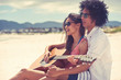 © Daxiao Productions - guitar beach couple