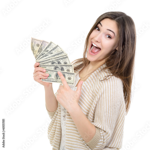 Fotografía Cheerful attractive young lady holding cash and happy smiling ov