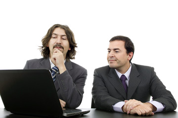 Two business men with laptop computer