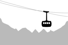 Cabin Cableway With Mountains In Background