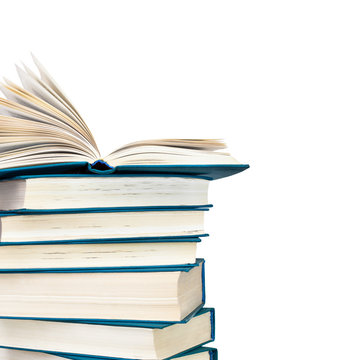 Detail of a pile of books on a white background
