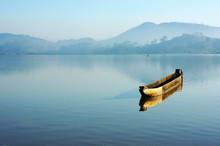 Charming Landscape With Lonely Wooden Boat (dug-out Canoe ) On L