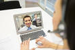 © ldprod - Businesswoman in the office on videoconference, headset, Skype