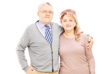 Poster - Middle aged couple in a hug looking at camera