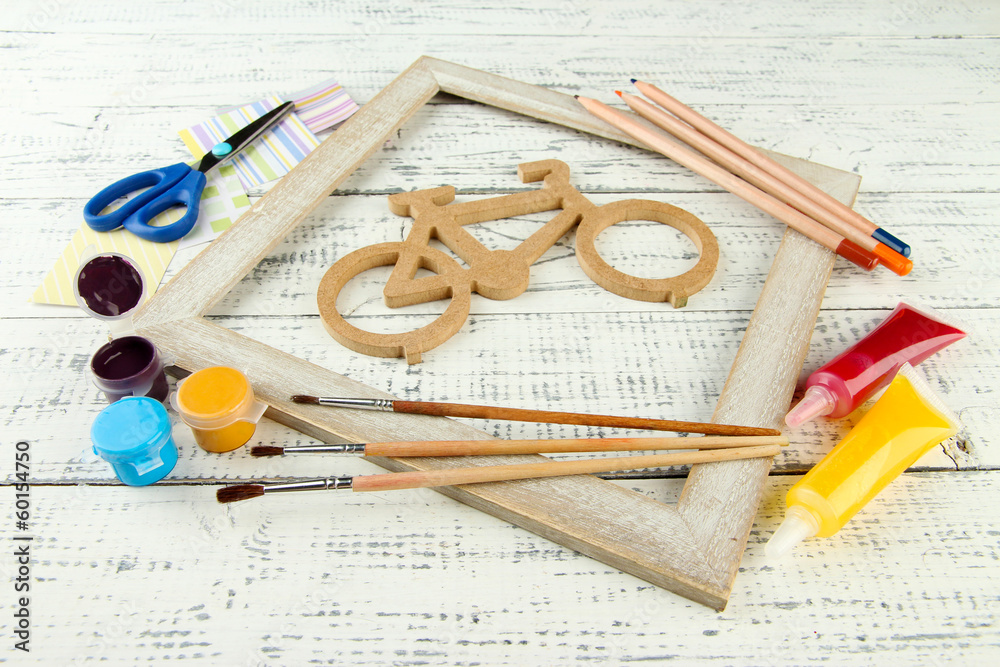 Decorative bicycle with needlework composition